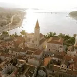 Misura * Traù